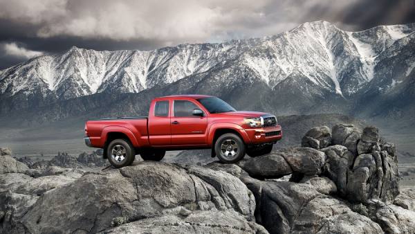 Photograph John Early Red Truck On Rocks on One Eyeland